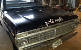 The Ford F-100 Project Truck, front view, sitting in the shop.